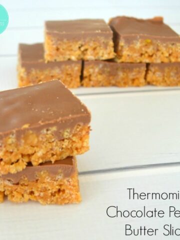 Crunchy based and chocolate topped slice pieces with text - Thermomix Chocolate Peanut Butter Slice.
