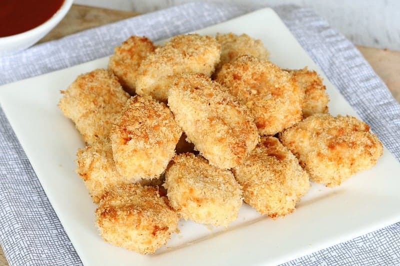 Thermomix Chicken Nuggets made with chicken mince, on a white square plate.