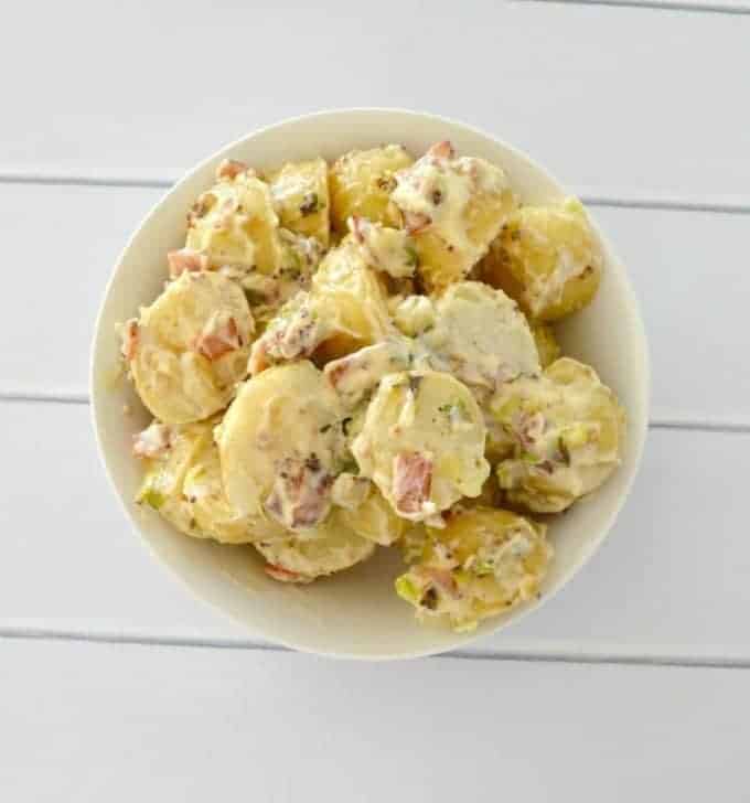 A bowl filled with chunky potato salad