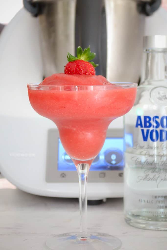 Our Thermomix Strawberry Vodka Slushies are the perfect summer drink! Boozy, fruity and totally ice cold!
