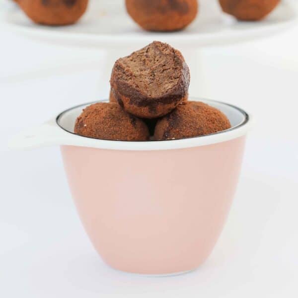 The easiest chocolate Thermomix Chocolate Tim Tam Balls made from Tim Tam biscuits, sweetened condensed milk and cocoa (or Milo) to roll the balls in!