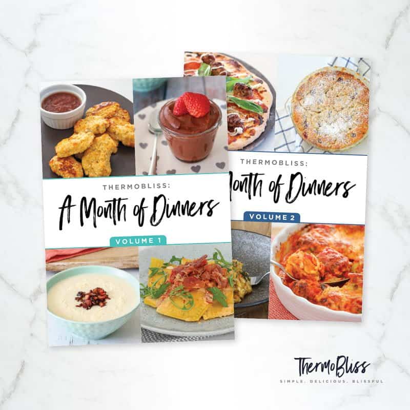 Two cookbooks with dinner recipes. 