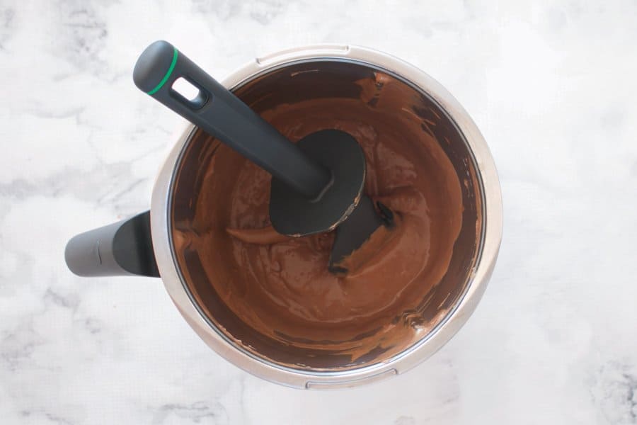 A Thermomix bowl with chocolate yogo. 
