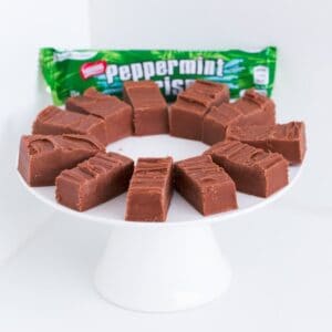 Pieces of Thermomix Peppermint Crisp Fudge on a plate.