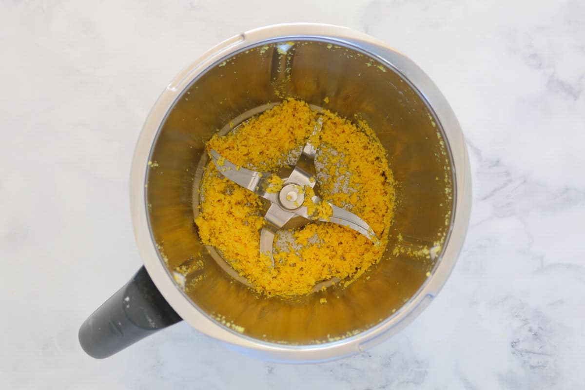 Finely grated lemon zest in a Thermomix.