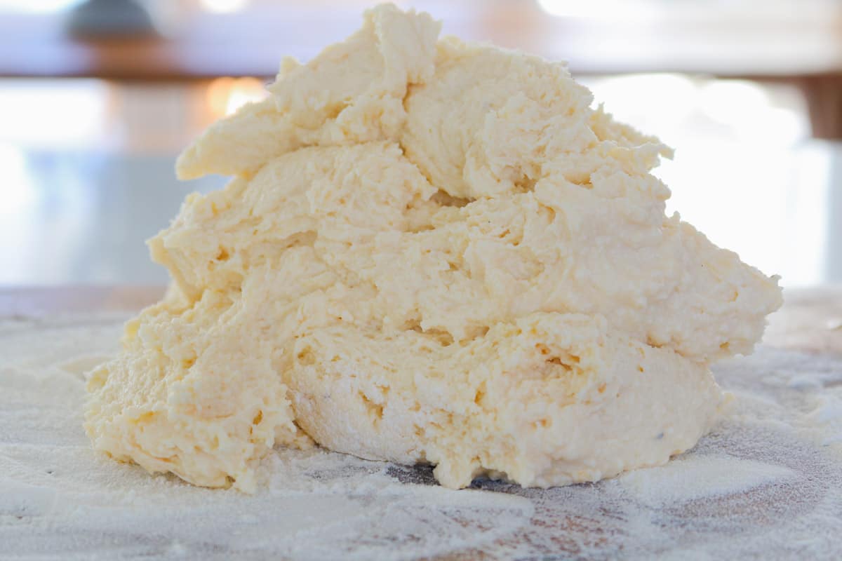 Gnocchi dough on a floured board.