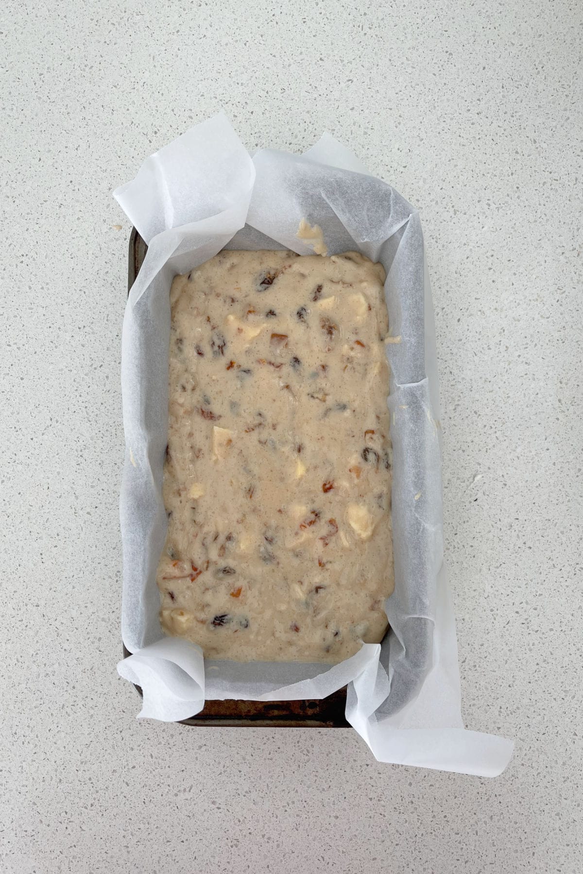 Thermomix Fruit Loaf batter in a baking dish ready to go into the oven.