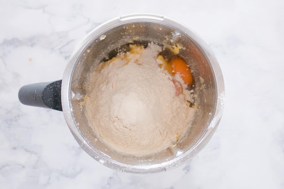 Flour and eggs in a Thermomix bowl.
