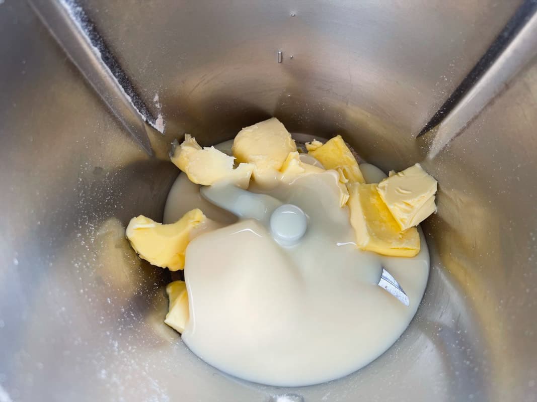 Sweetened condensed milk and butter in a Thermomix.