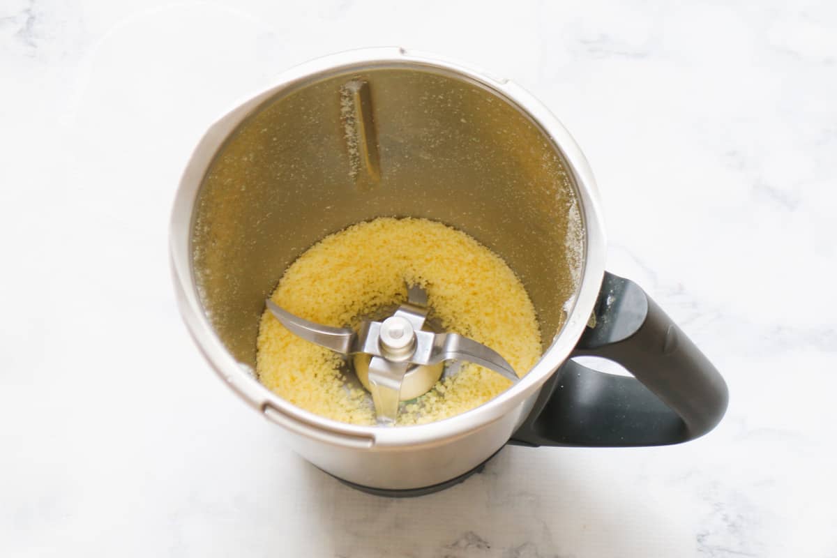 Grated parmesan in a Thermomix bowl.