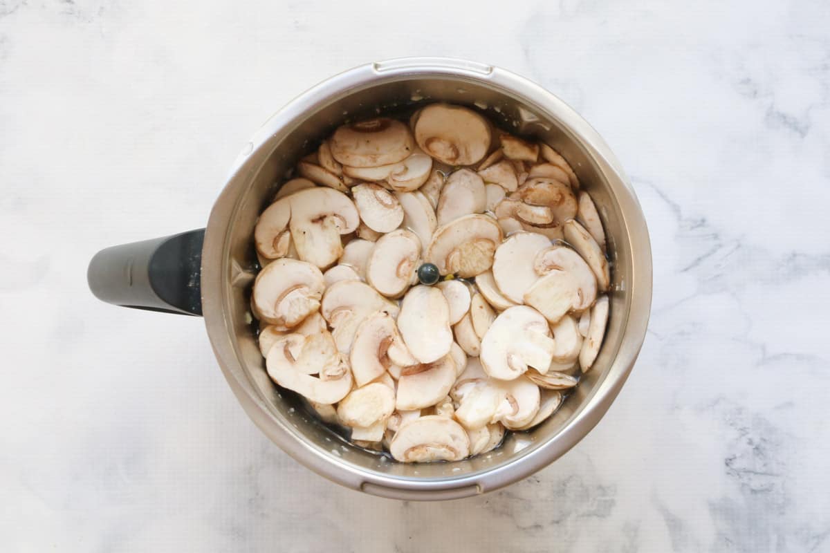 Mushrooms in a Thermomix bowl.