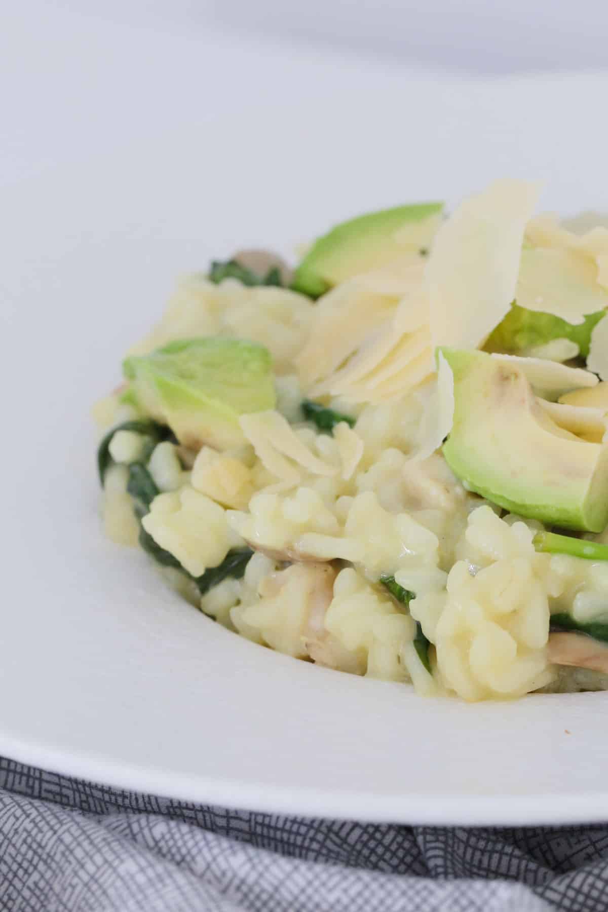 A risotto with baby spinach and avocado.