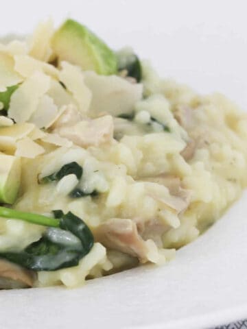 A risotto with baby spinach and avocado.