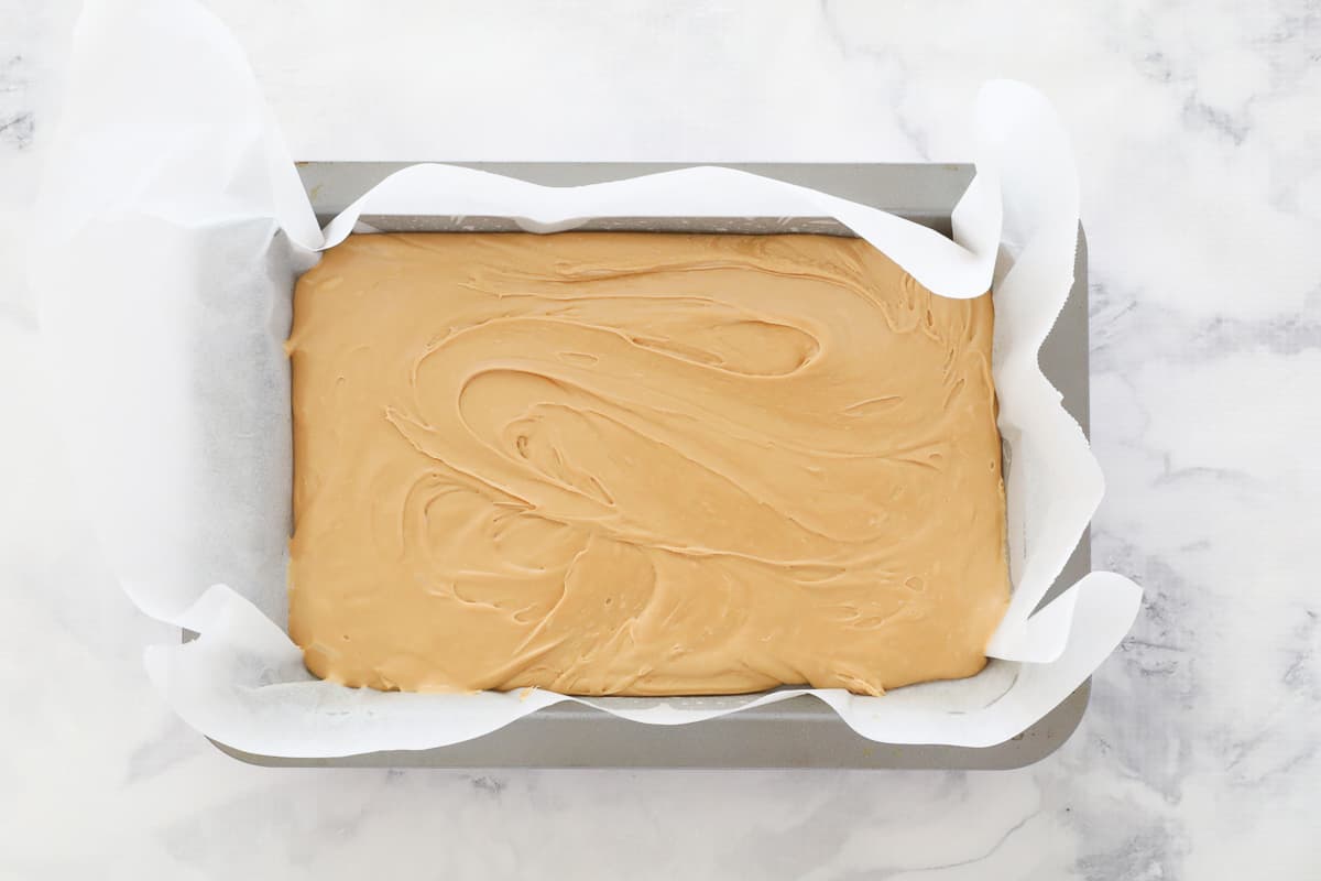 Caramel fudge in a baking tray.