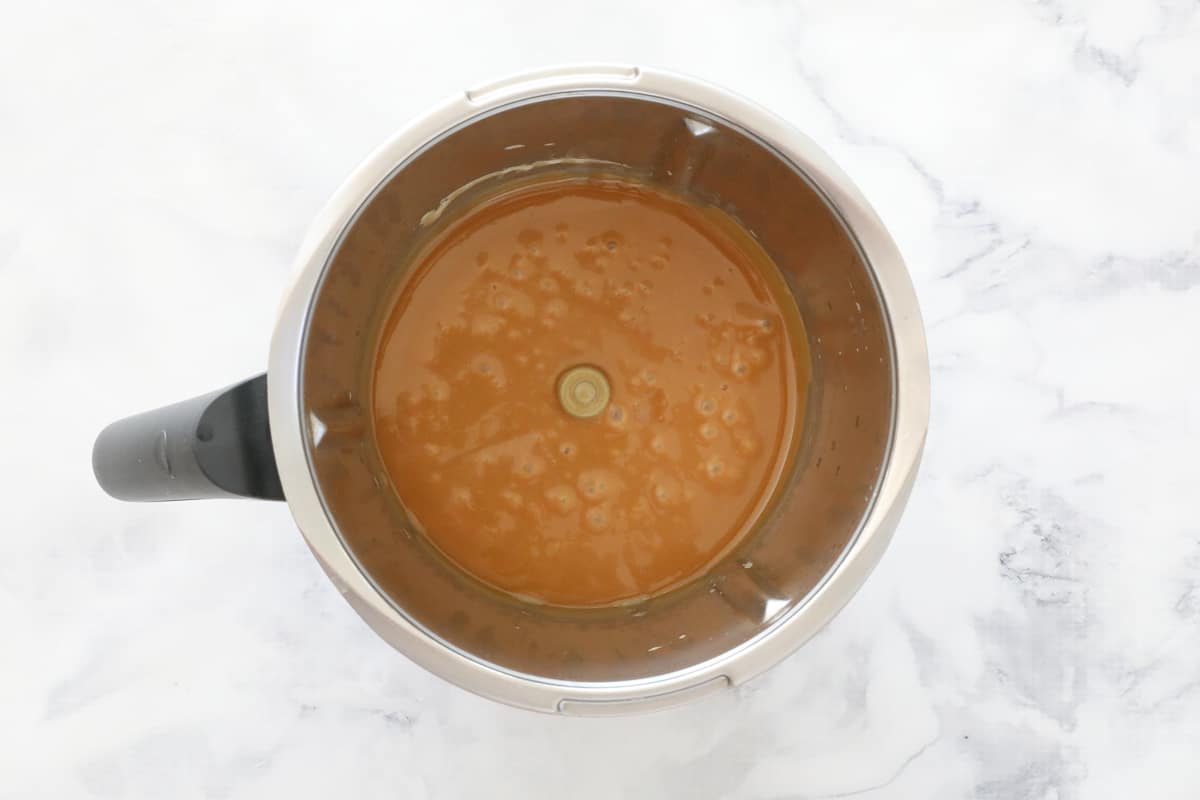 Bubbling caramel in a Thermomix bowl.