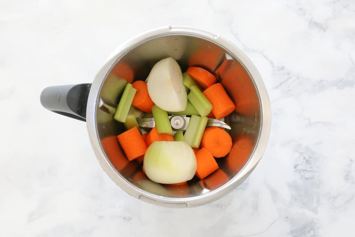Vegetables in a Thermomix bowl.
