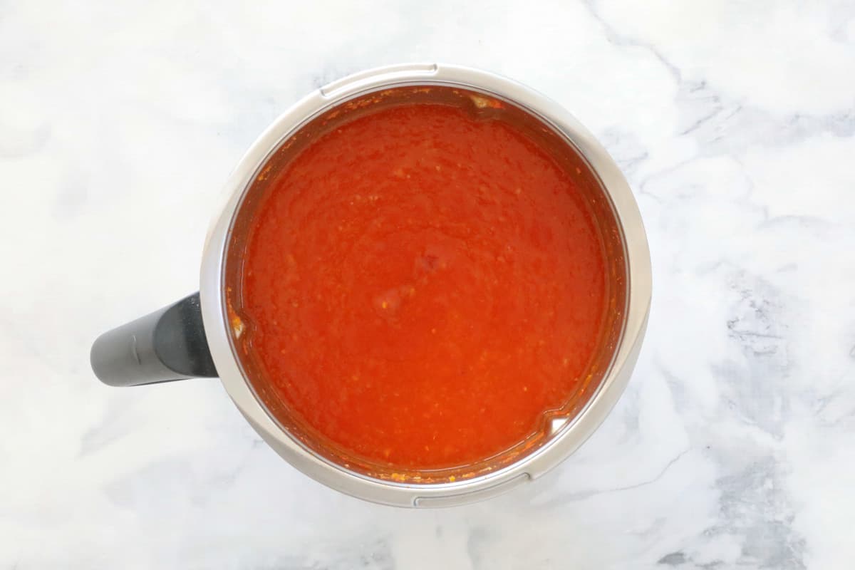 Tomato soup in a stainless jug.