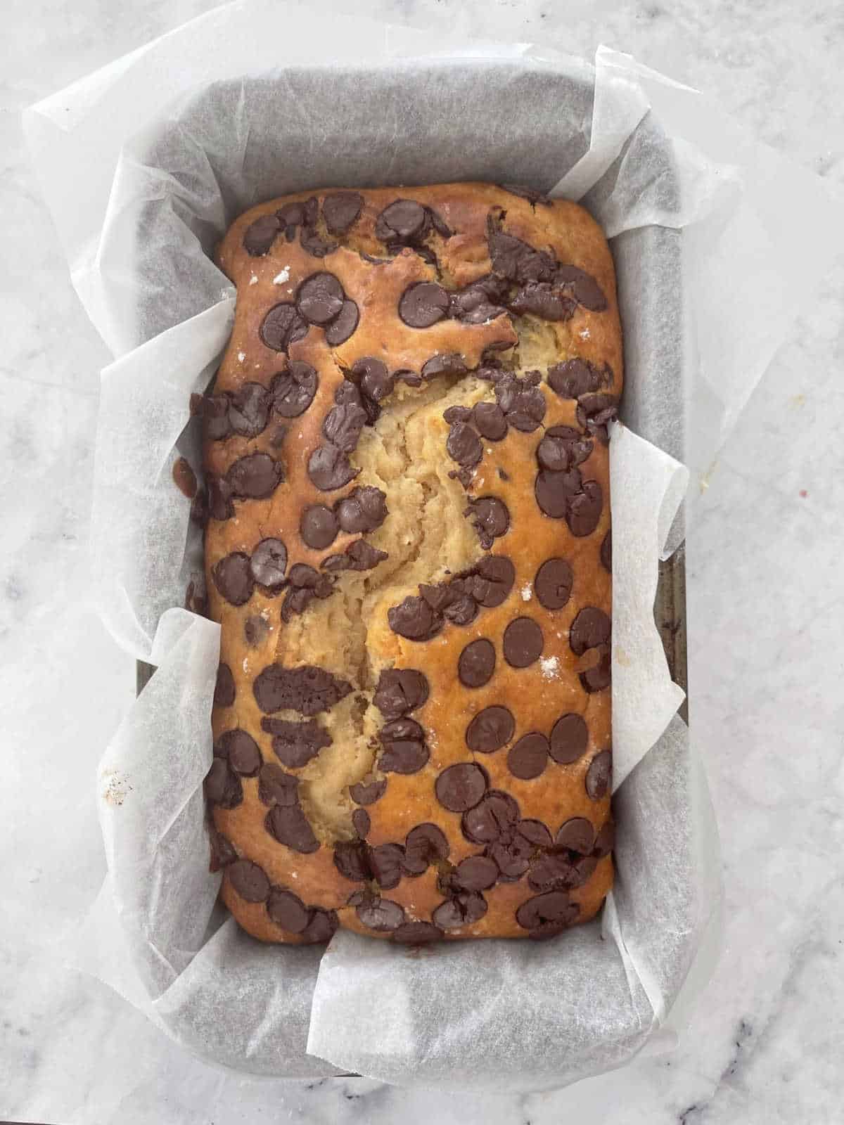 Chocolate Chip Banana Bread in a loaf tin.