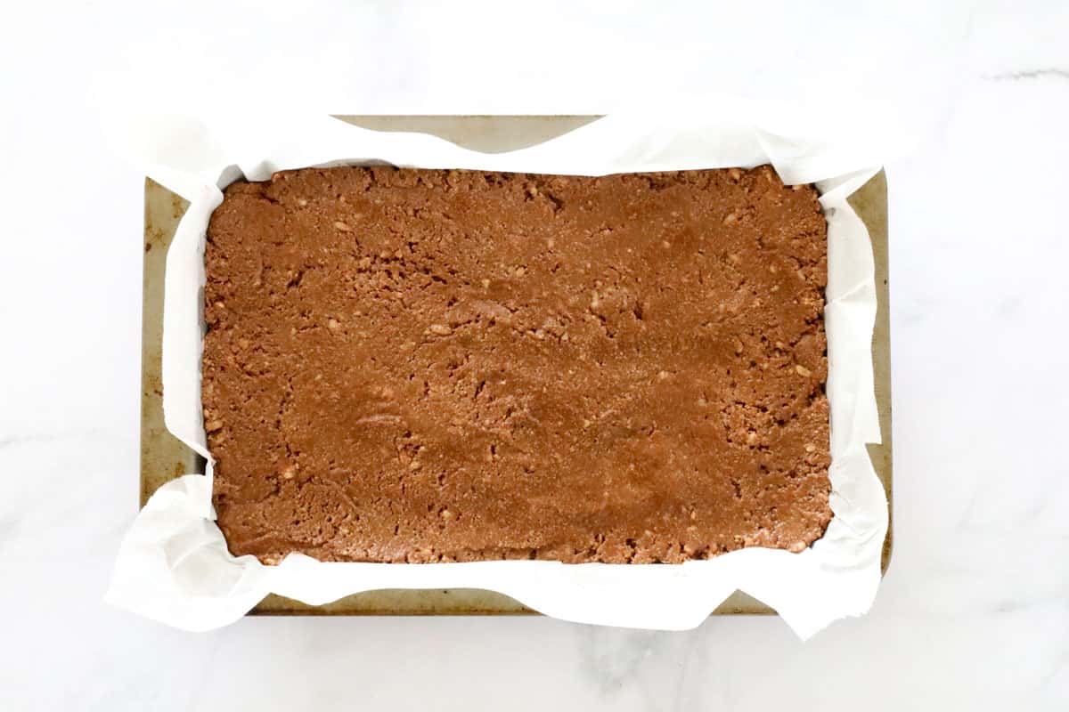 Chocolate slice in a baking tin.