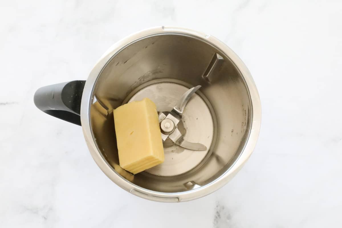 Cheese in a stainless jug.