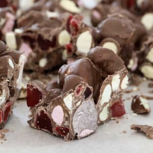 Chunks of rocky road on a chopping board.