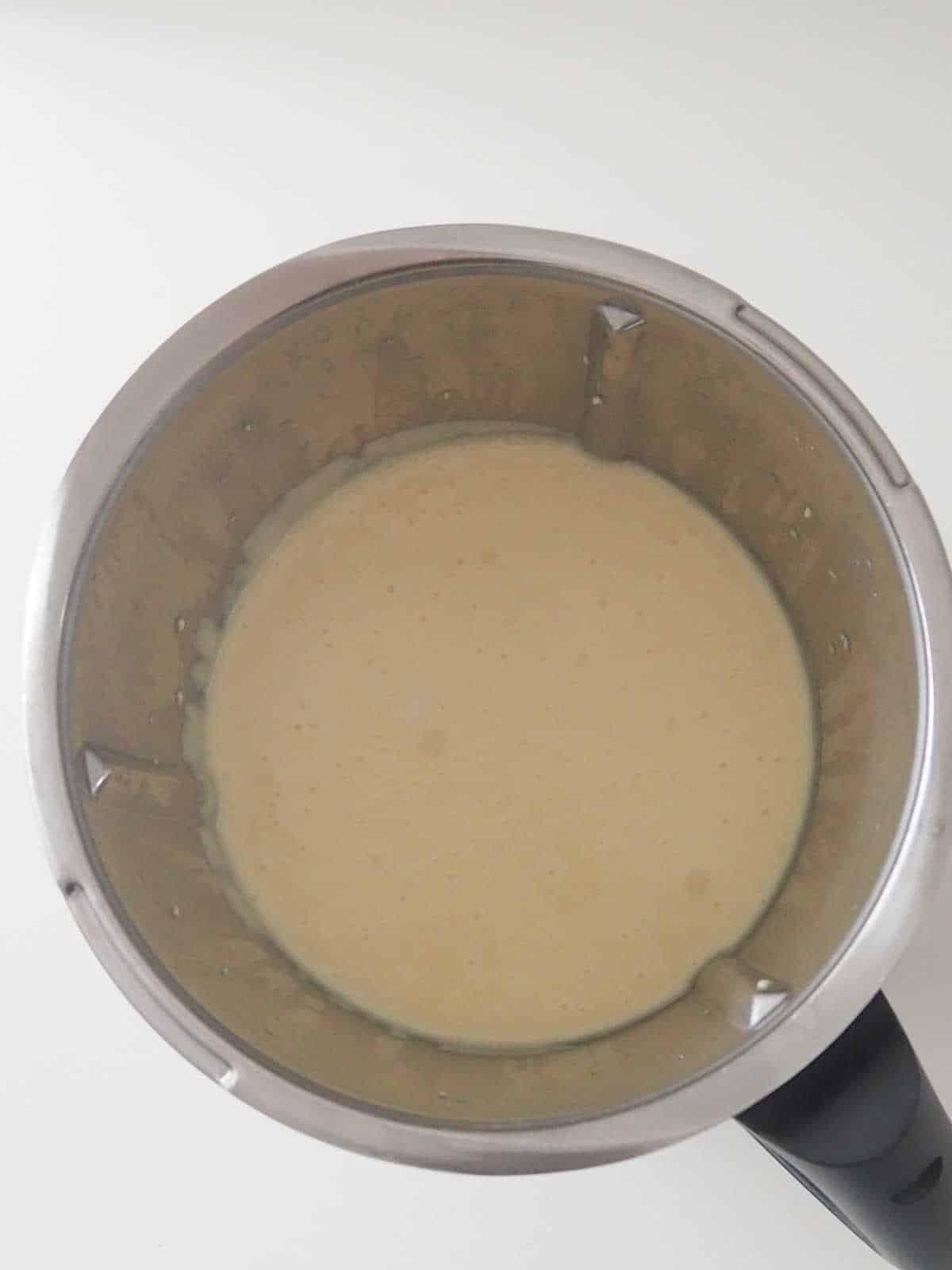 melted white chocolate in a thermomix bowl,