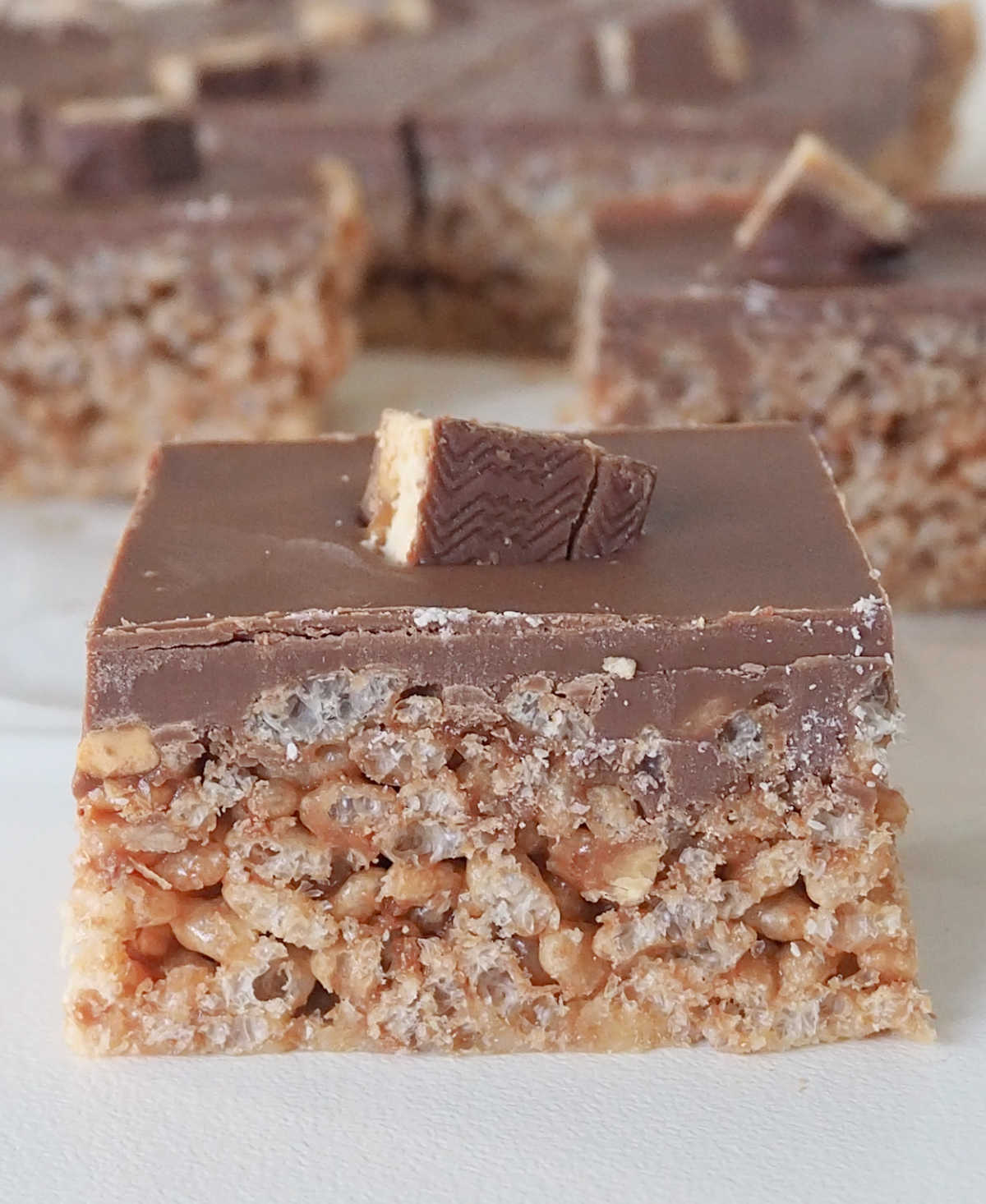 side view of pieces of Thermomix Snickers Slice.