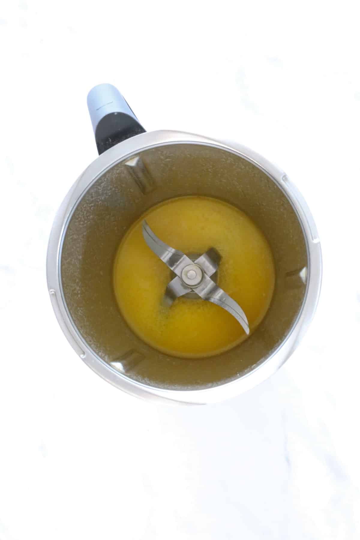 Melted butter in a stainless jug