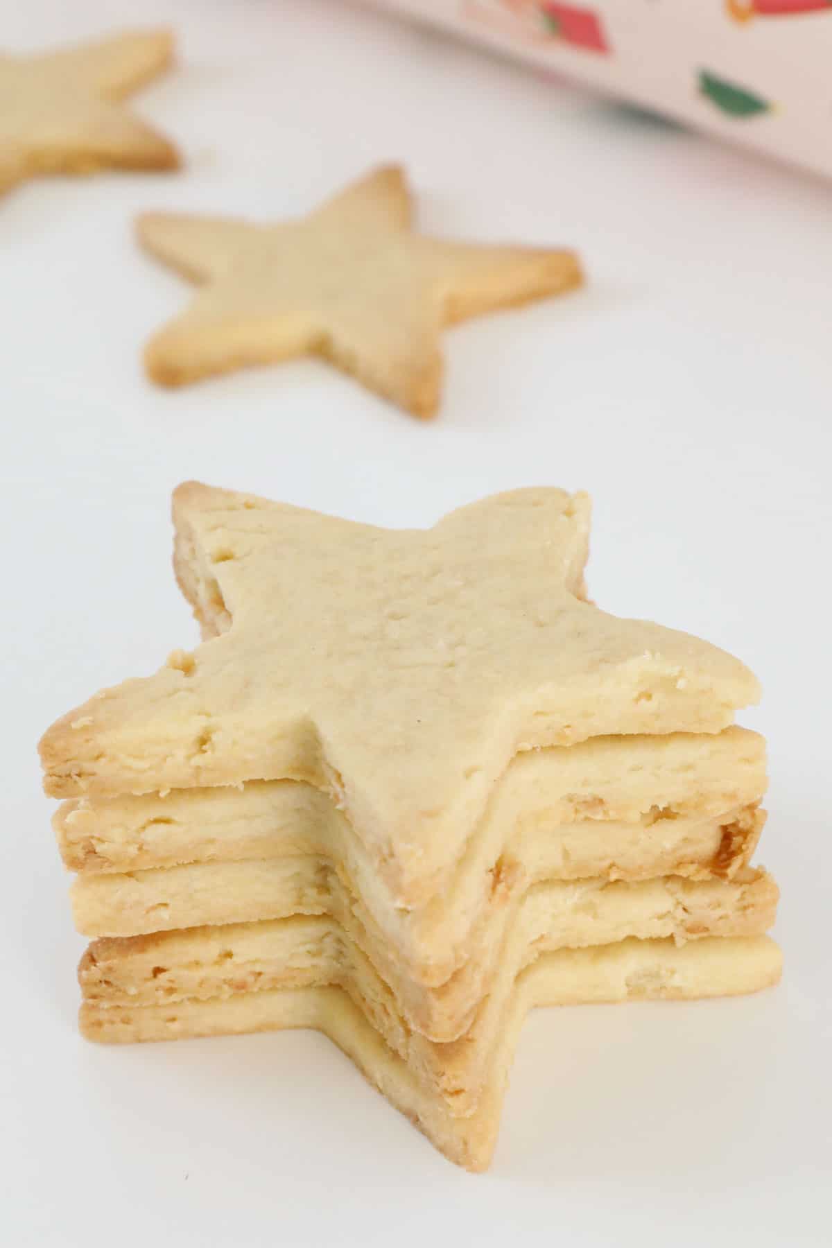 A stack of star shaped shortbread cookies.