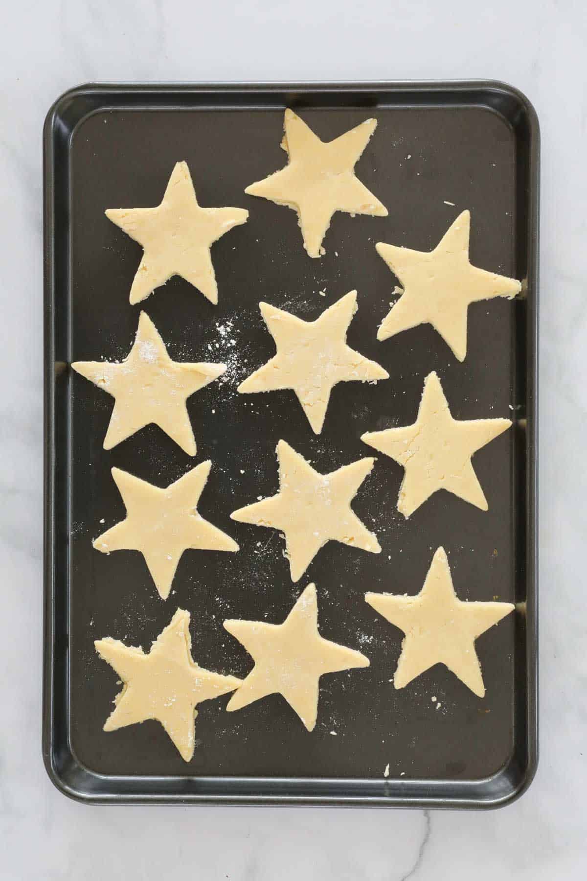 Star cookies on a baking tray.