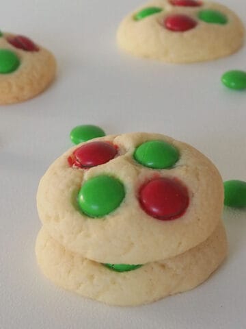 Thermomix Christmas Biscuits on a white background with red and green m&Ms around.
