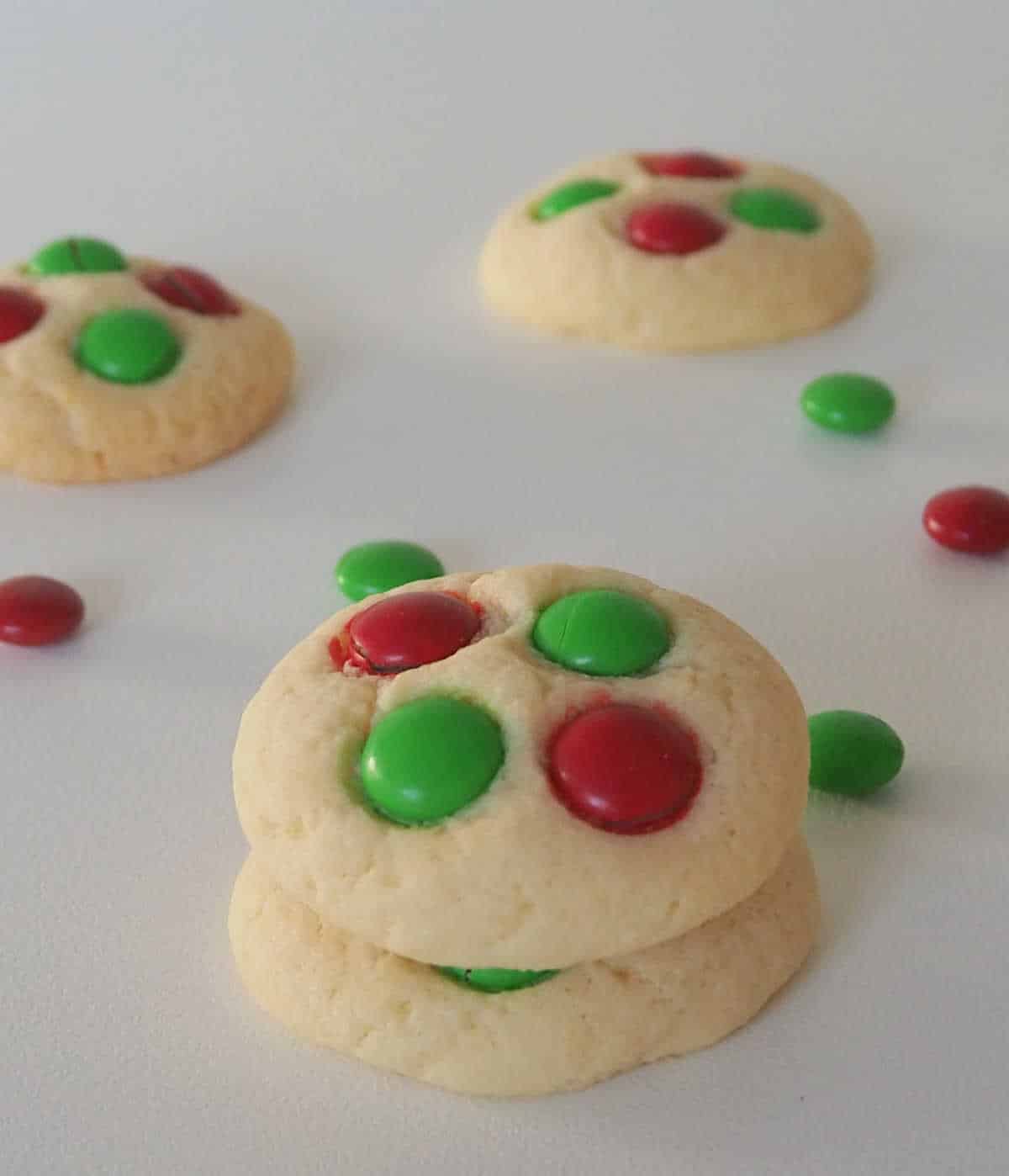 Thermomix Christmas Biscuits on a white background with red and green m&Ms around.