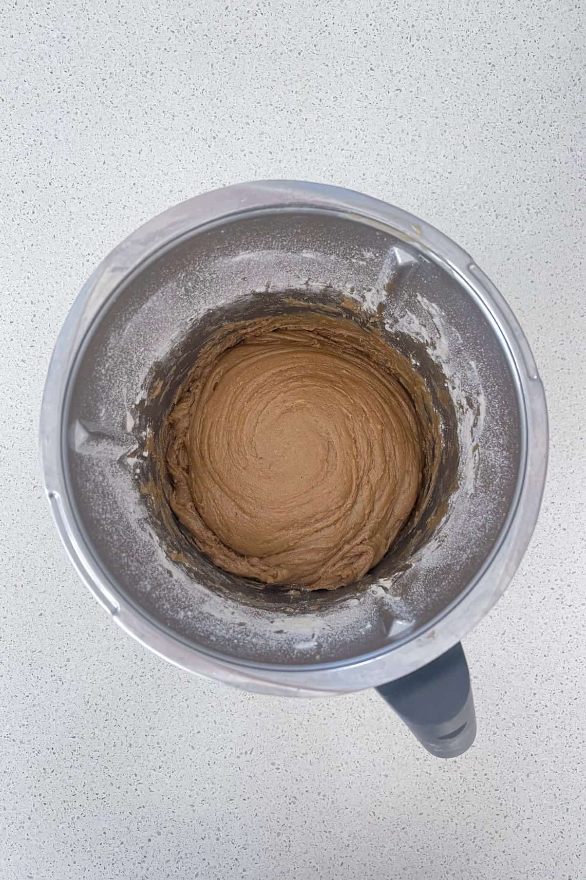 Gingerbread dough mixed together in a thermomix bowl.
