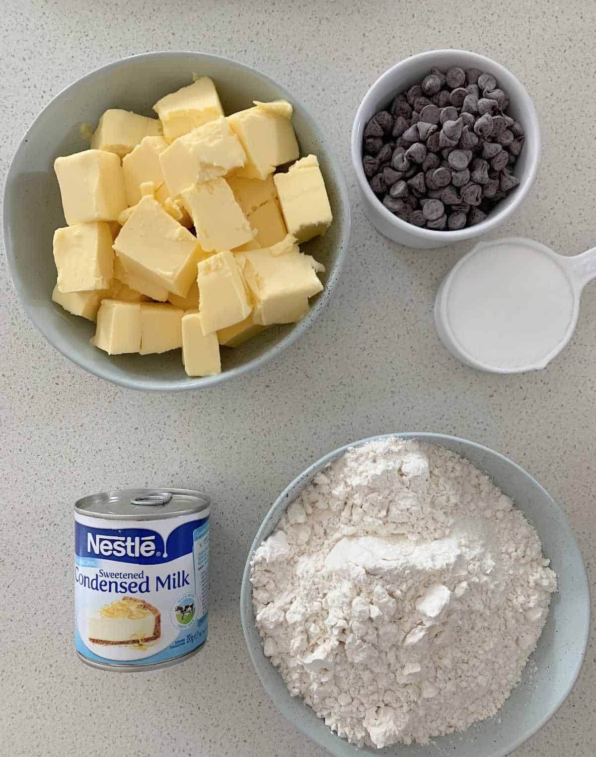 Ingredients needed to make Condensed Milk Cookies.