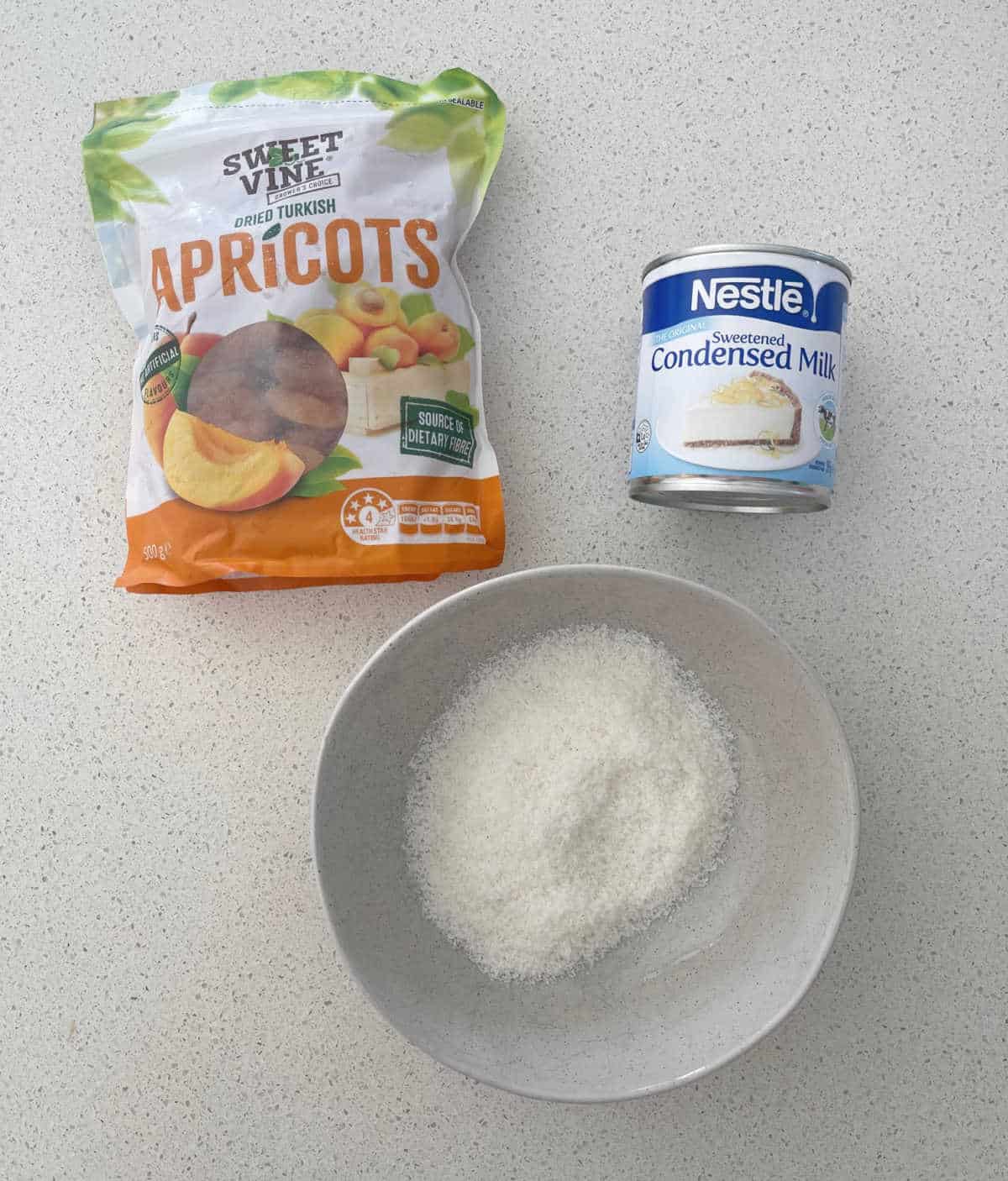 ingredients to make apricot and coconut balls.