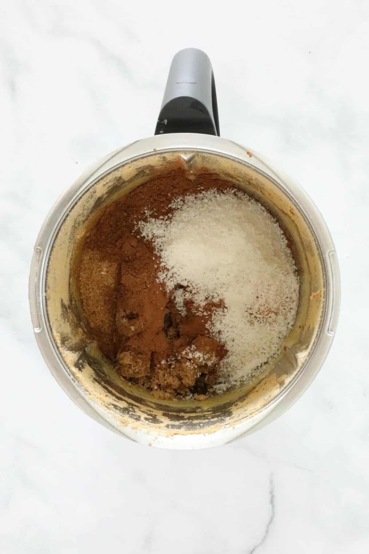 A thermomix with coconut, cocoa in it