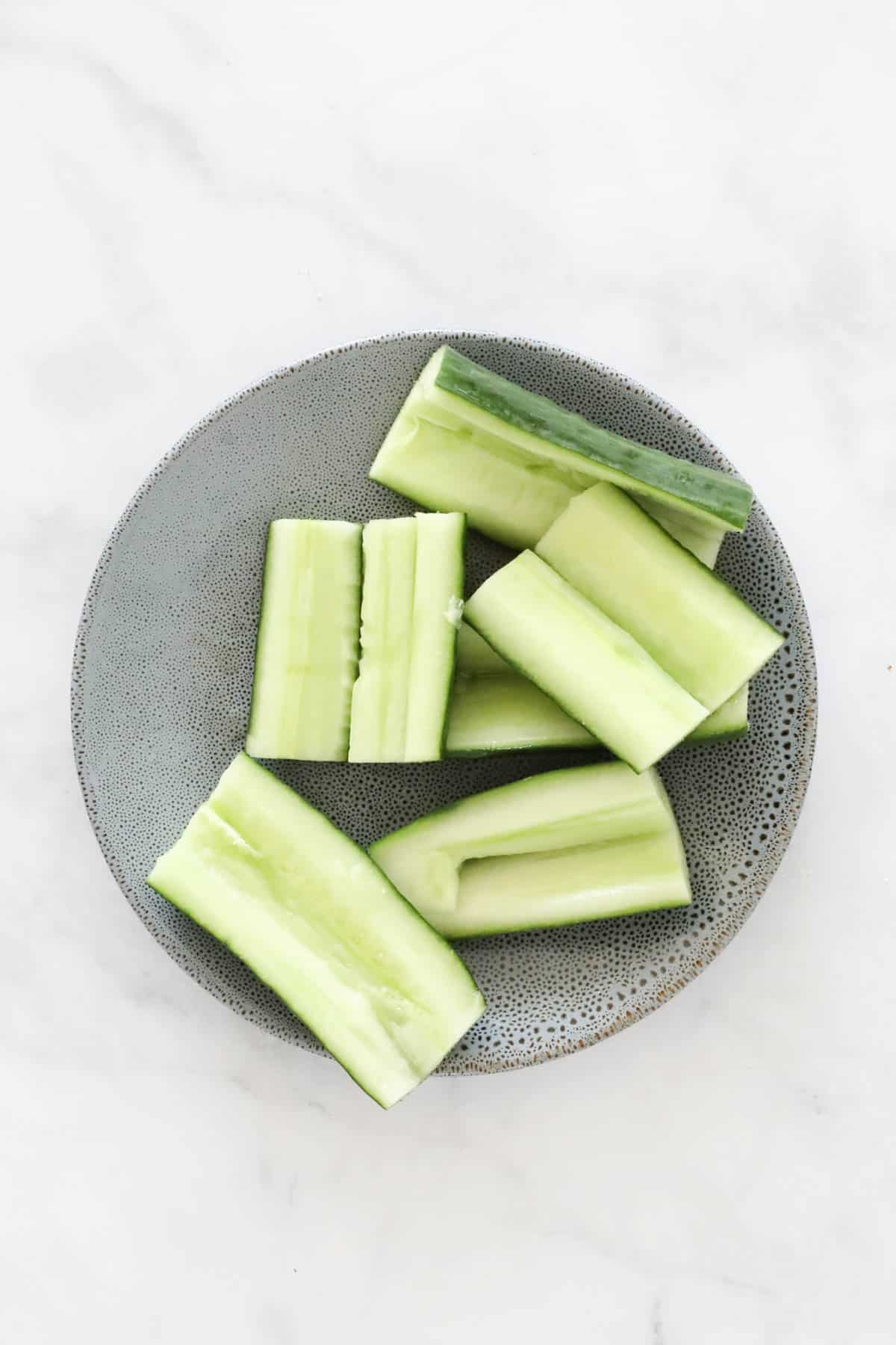 Sliced cucumber on a plate.