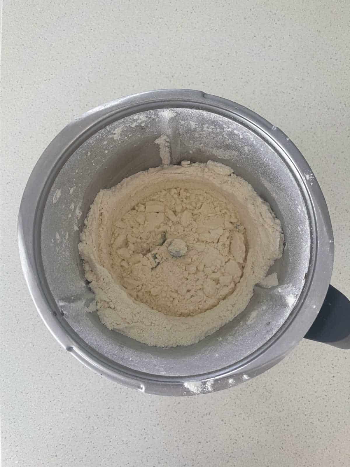 Butter combined with flour in a Thermomix bowl.