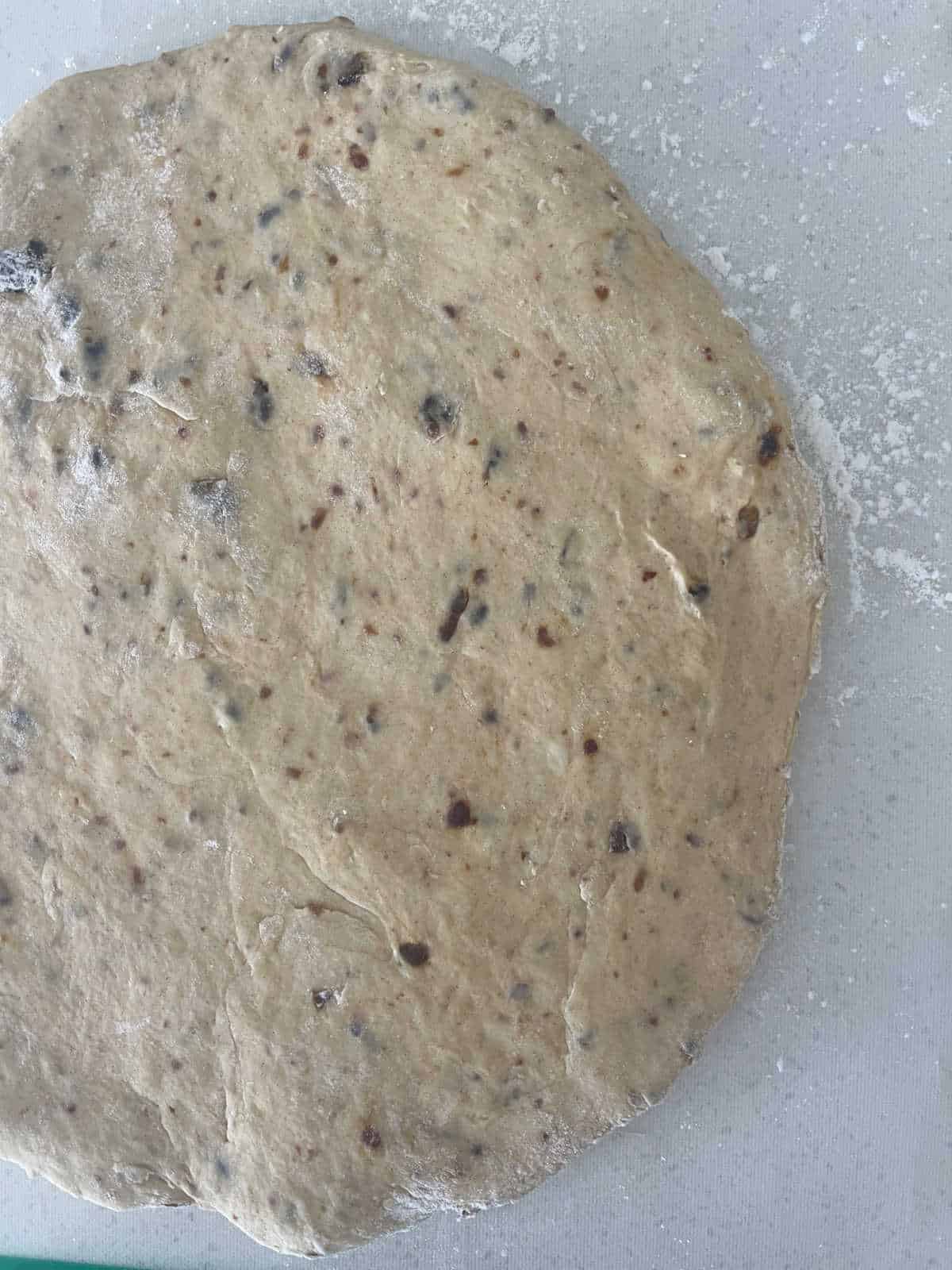 Date scone mixture rolled out on a thermomat.
