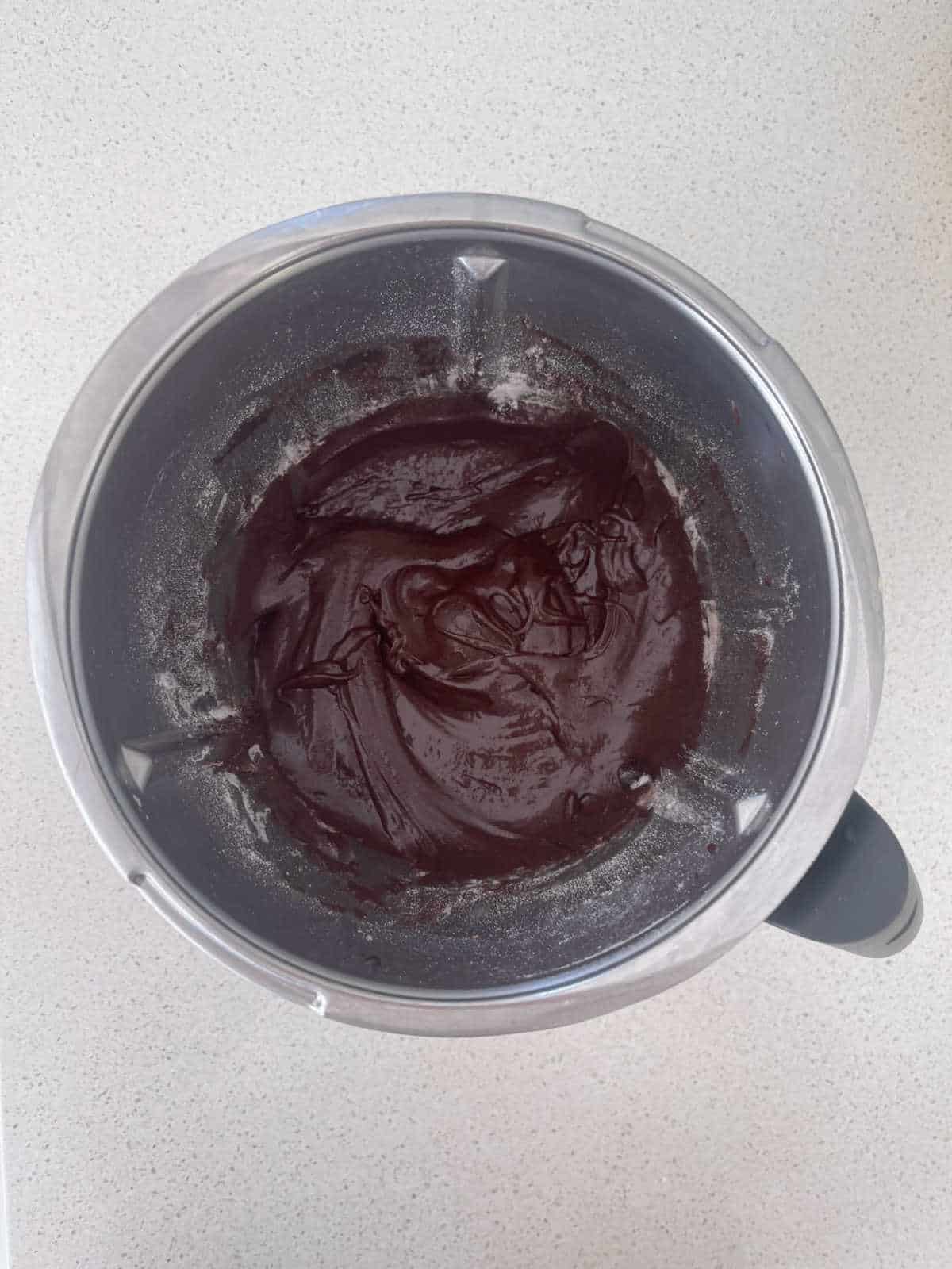 Brownie ingredients melted together in a Thermomix bowl.