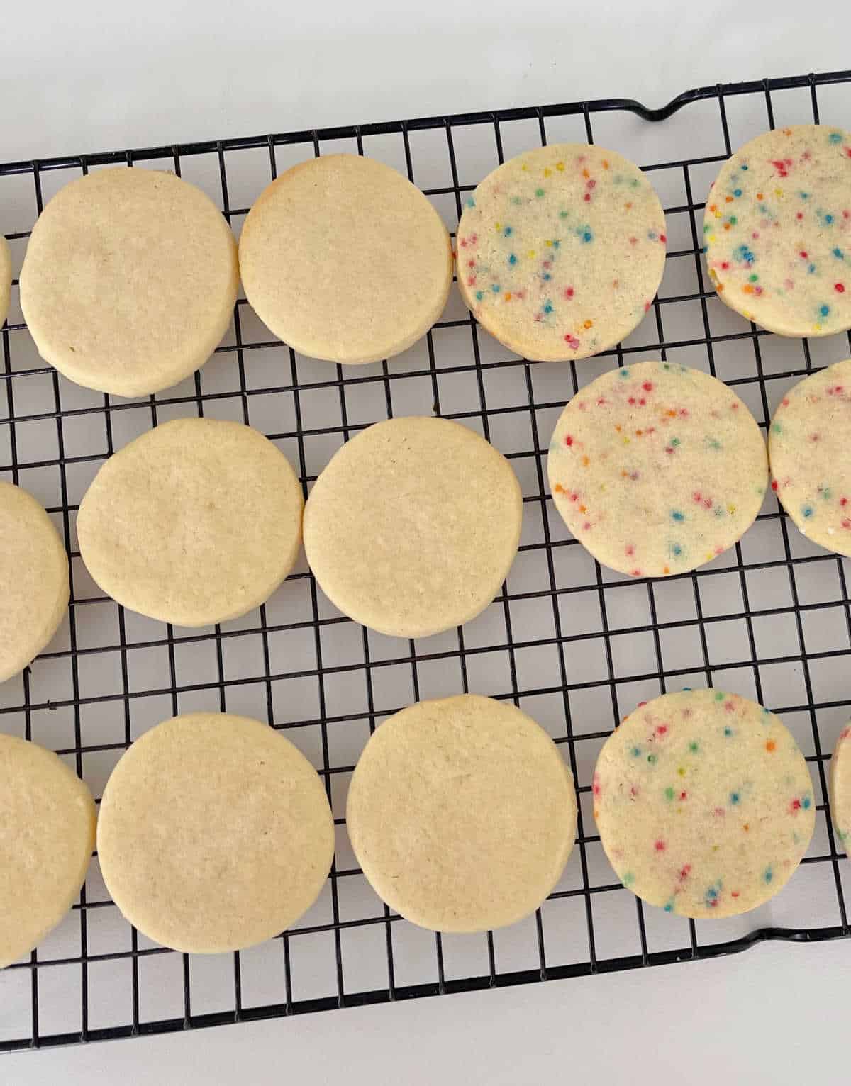 Sugar Cookies sitting on a wire baking rack.