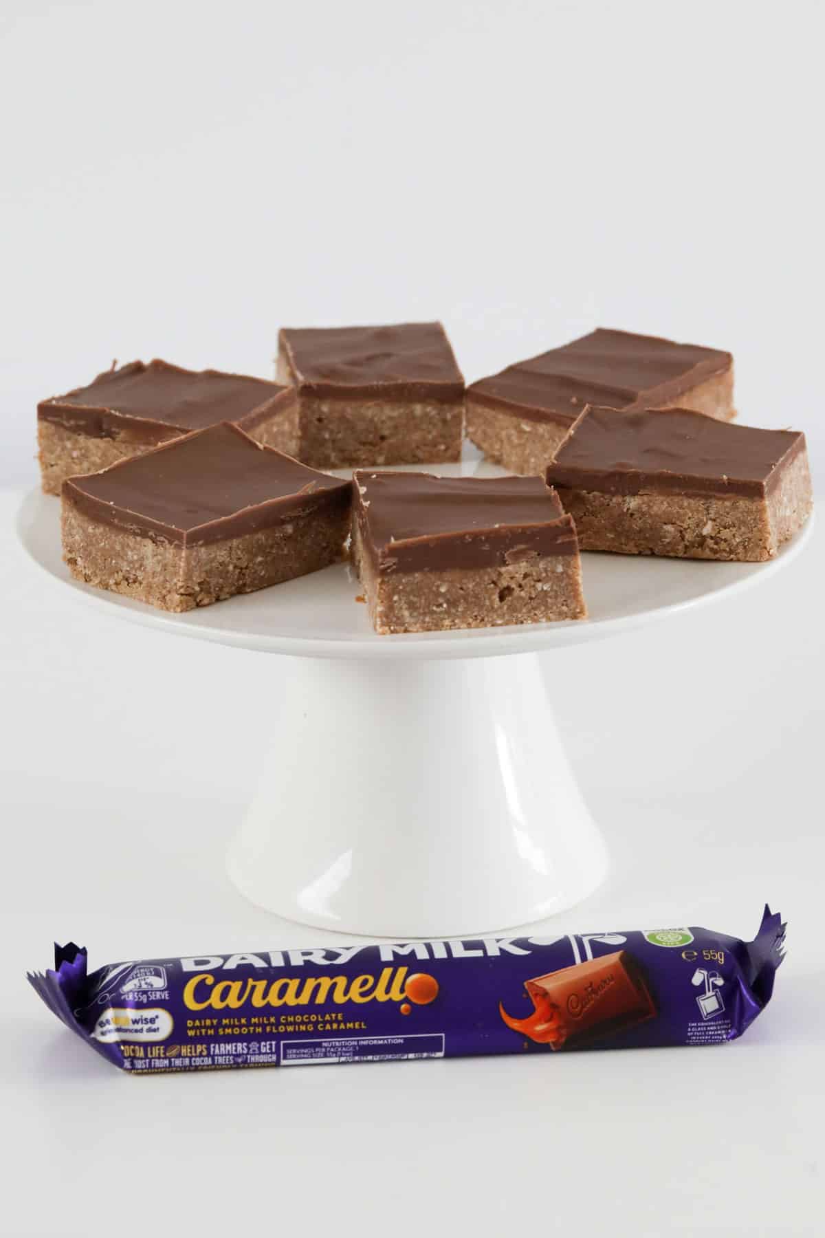 A cake stand filled with pieces of chocolate slice.