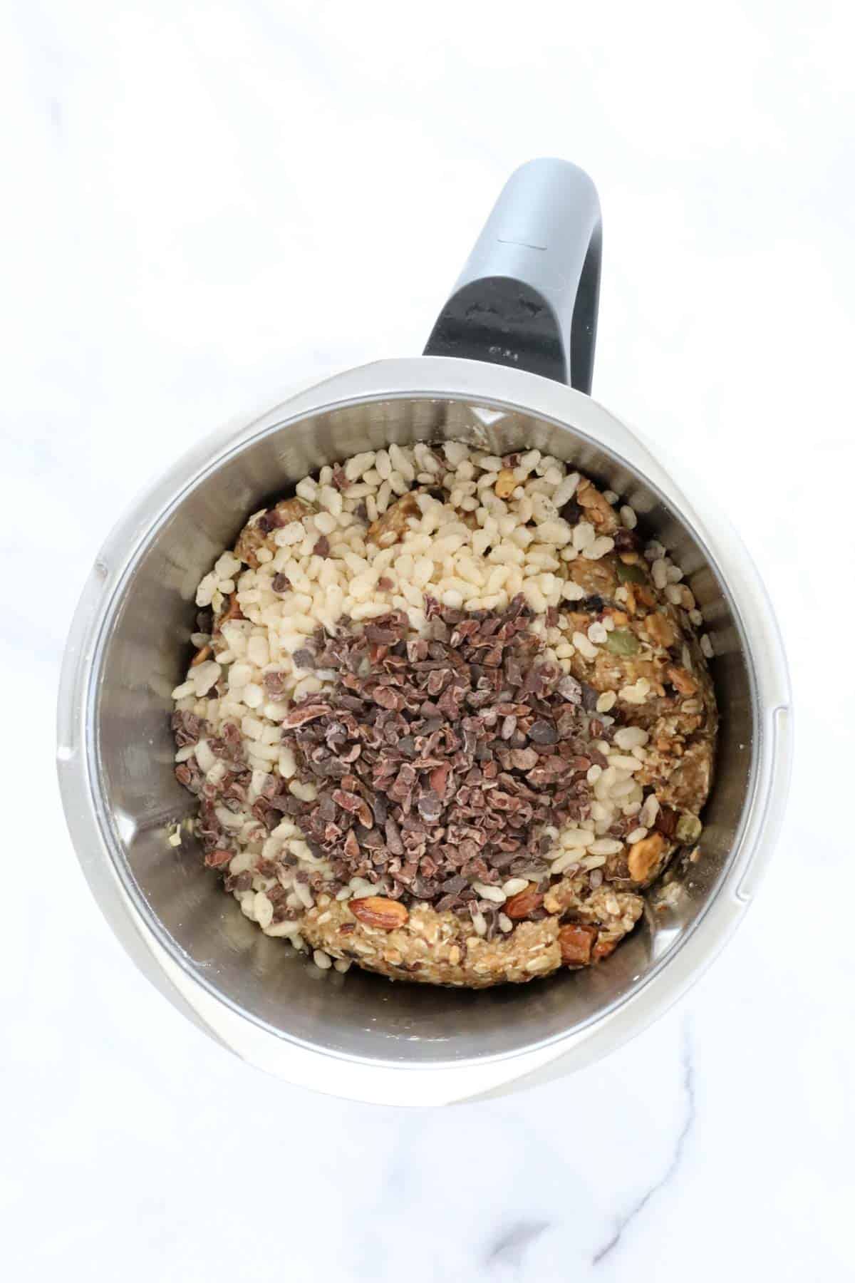Puffed rice and cacao nibs in a Thermomix.