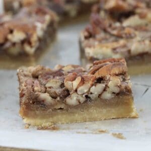 Pieces of nut slice on a board.