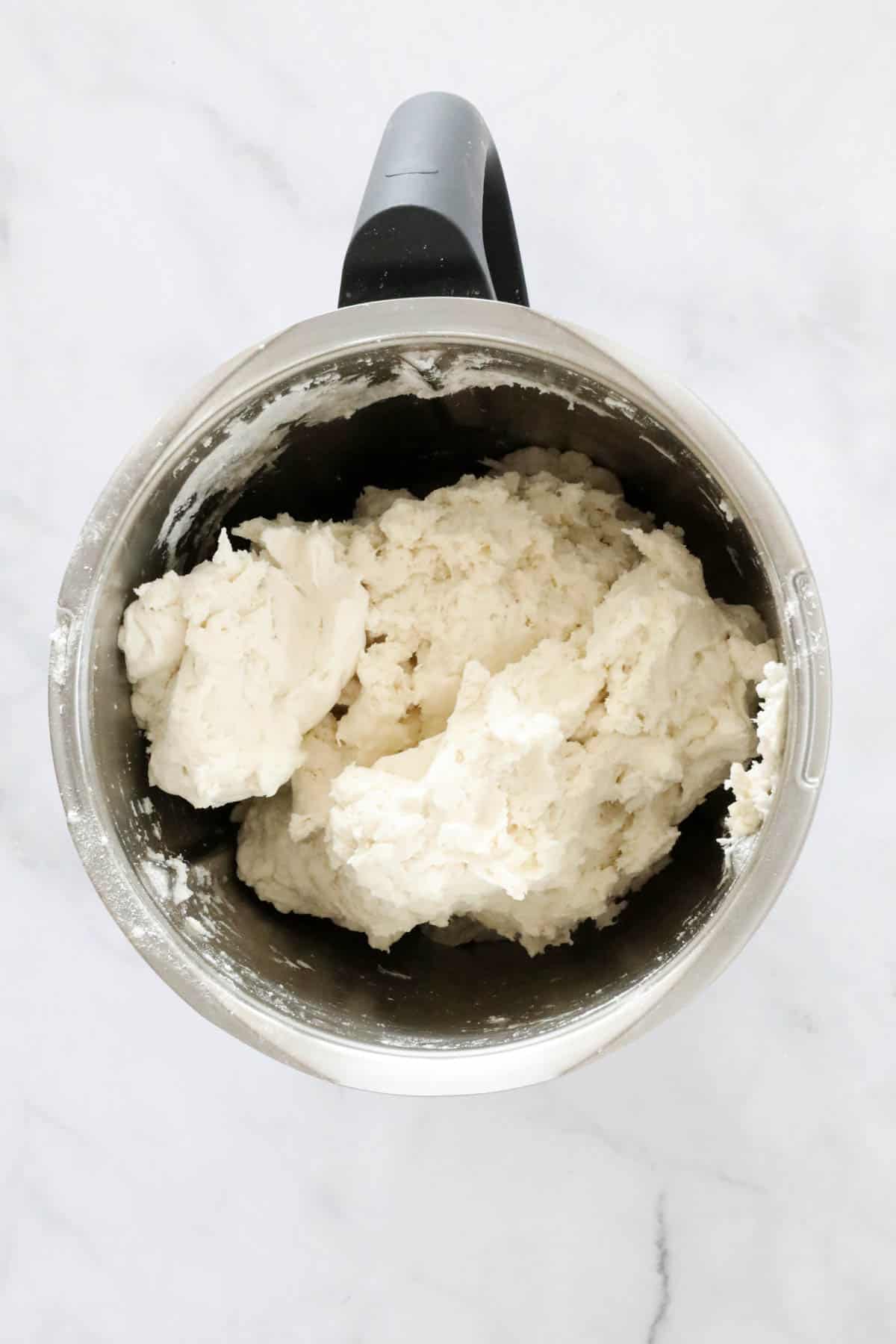 Dough in a Thermomix bowl.