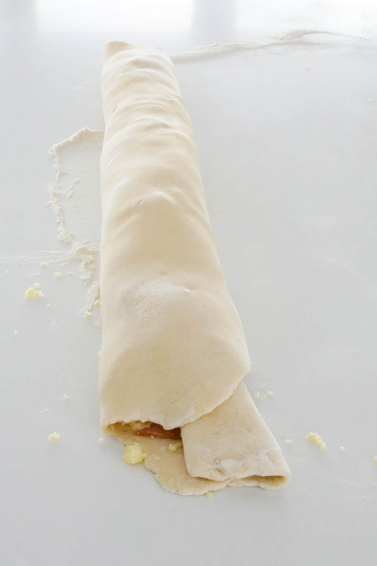 A rolled up tube of dough.