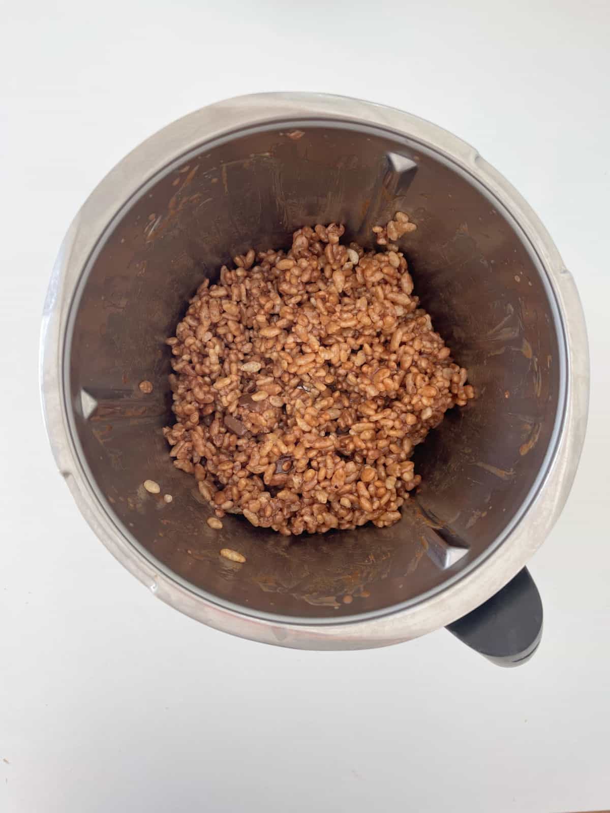 Combined Mars Bar Slice ingredients in a thermomix bowl.