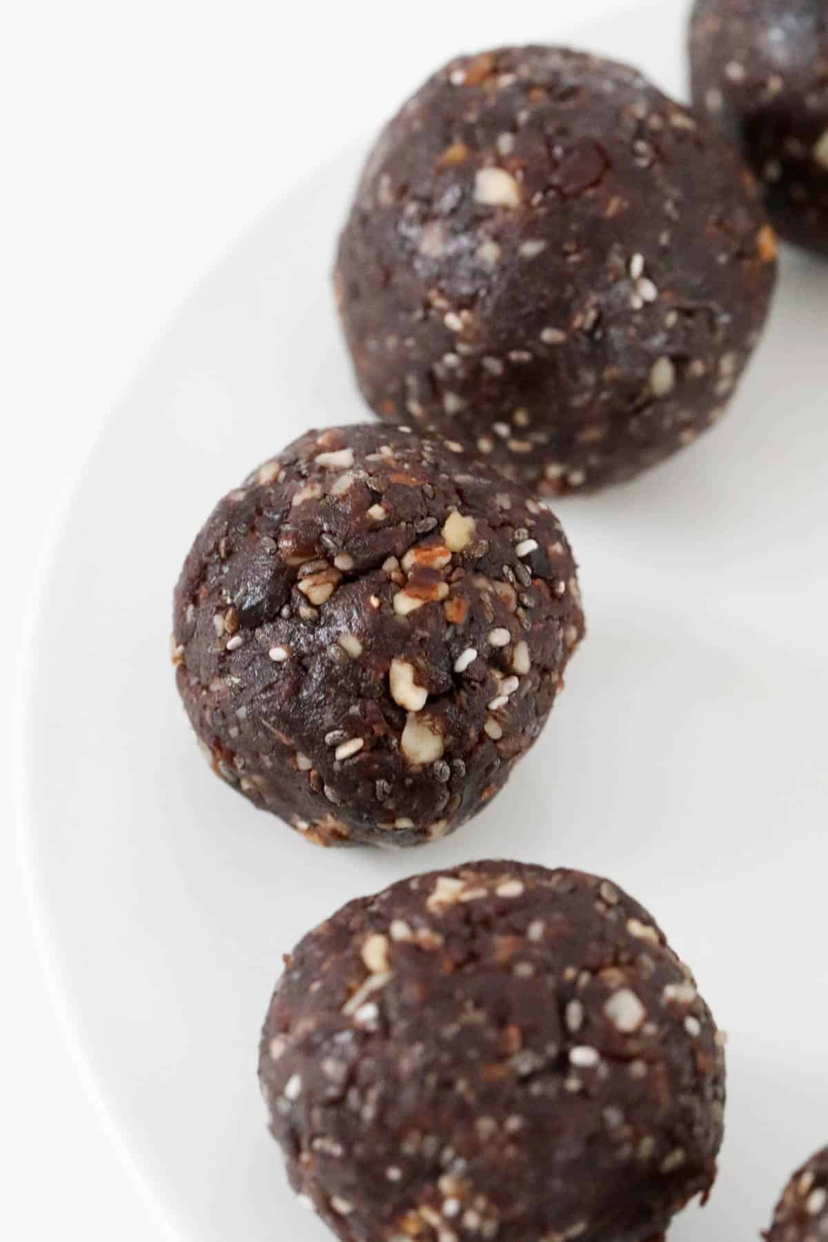 Healthy bliss balls on a plate.