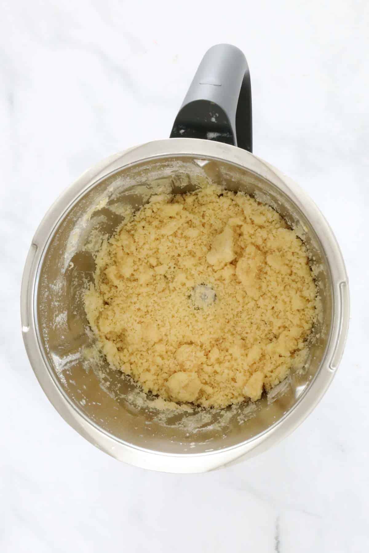 Crumbly mixture in a Thermomix.