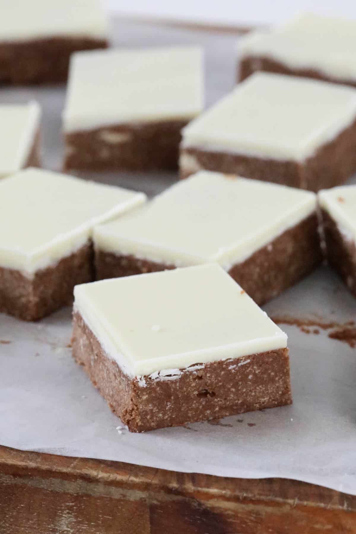 Pieces of white and brown peppermint slice.